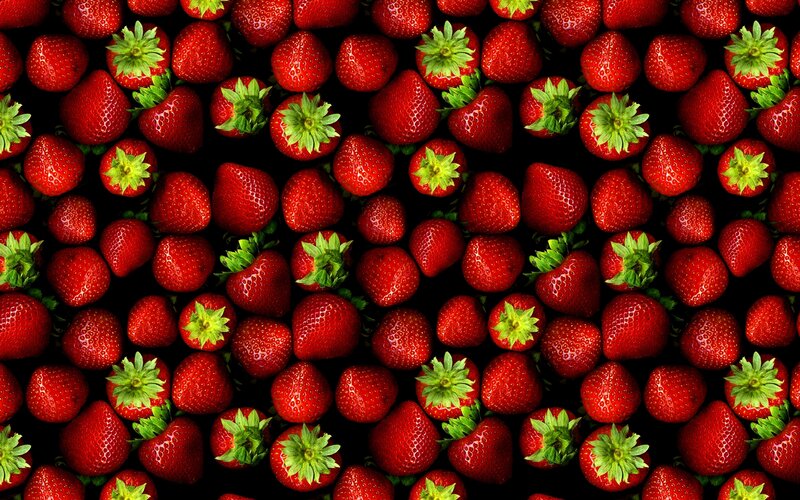 strawberries on black background