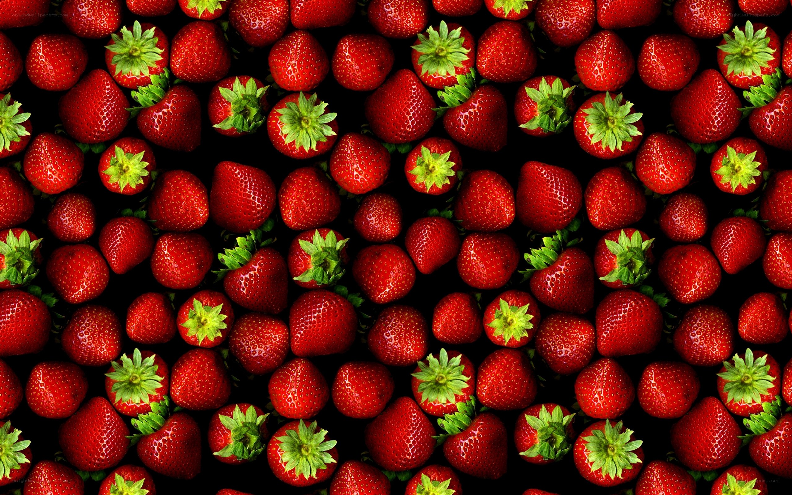 strawberries on black background