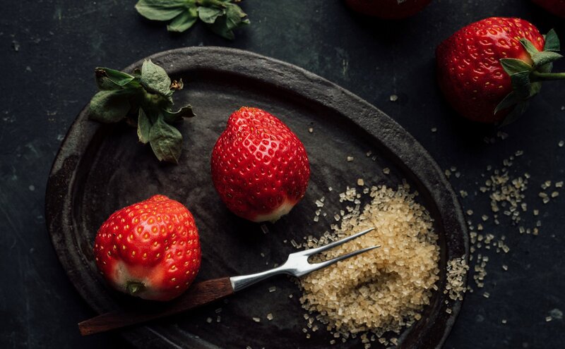 Strawberries on Dark Plate