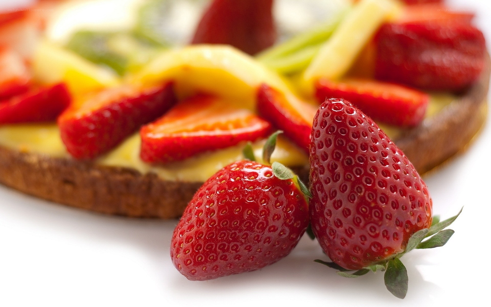 strawberries on fruit tart