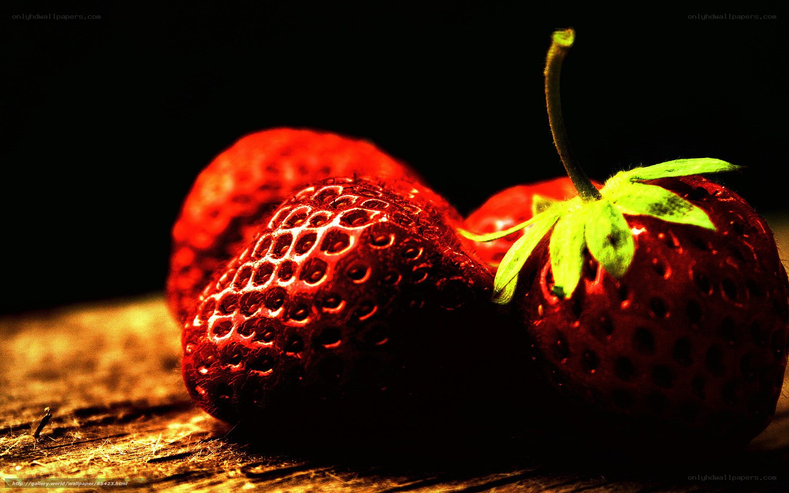 Strawberries on wooden surface
