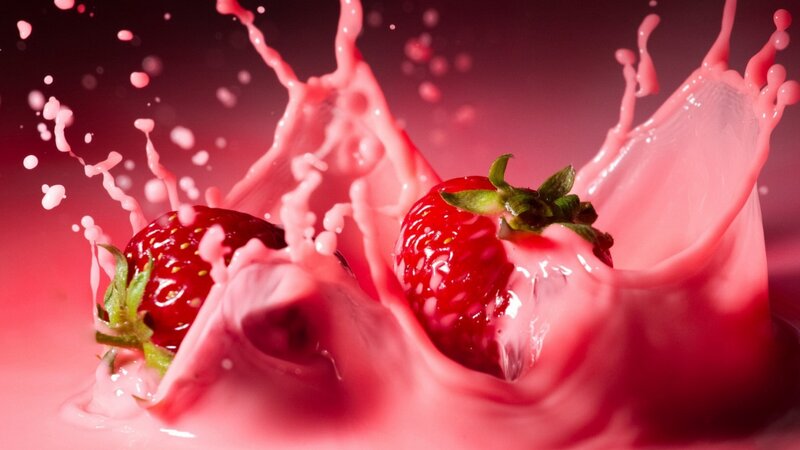 Strawberries Splashing in Liquid