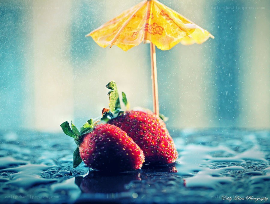 strawberries under a tiny umbrella