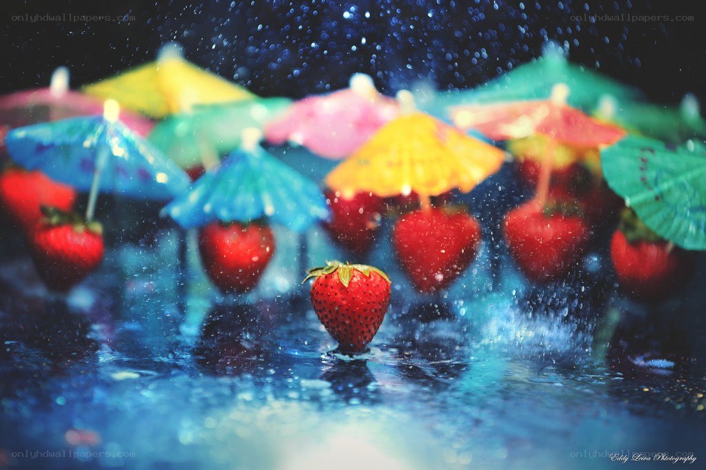 strawberries with cocktail umbrellas