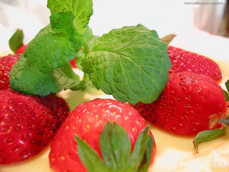 strawberries with mint leaves