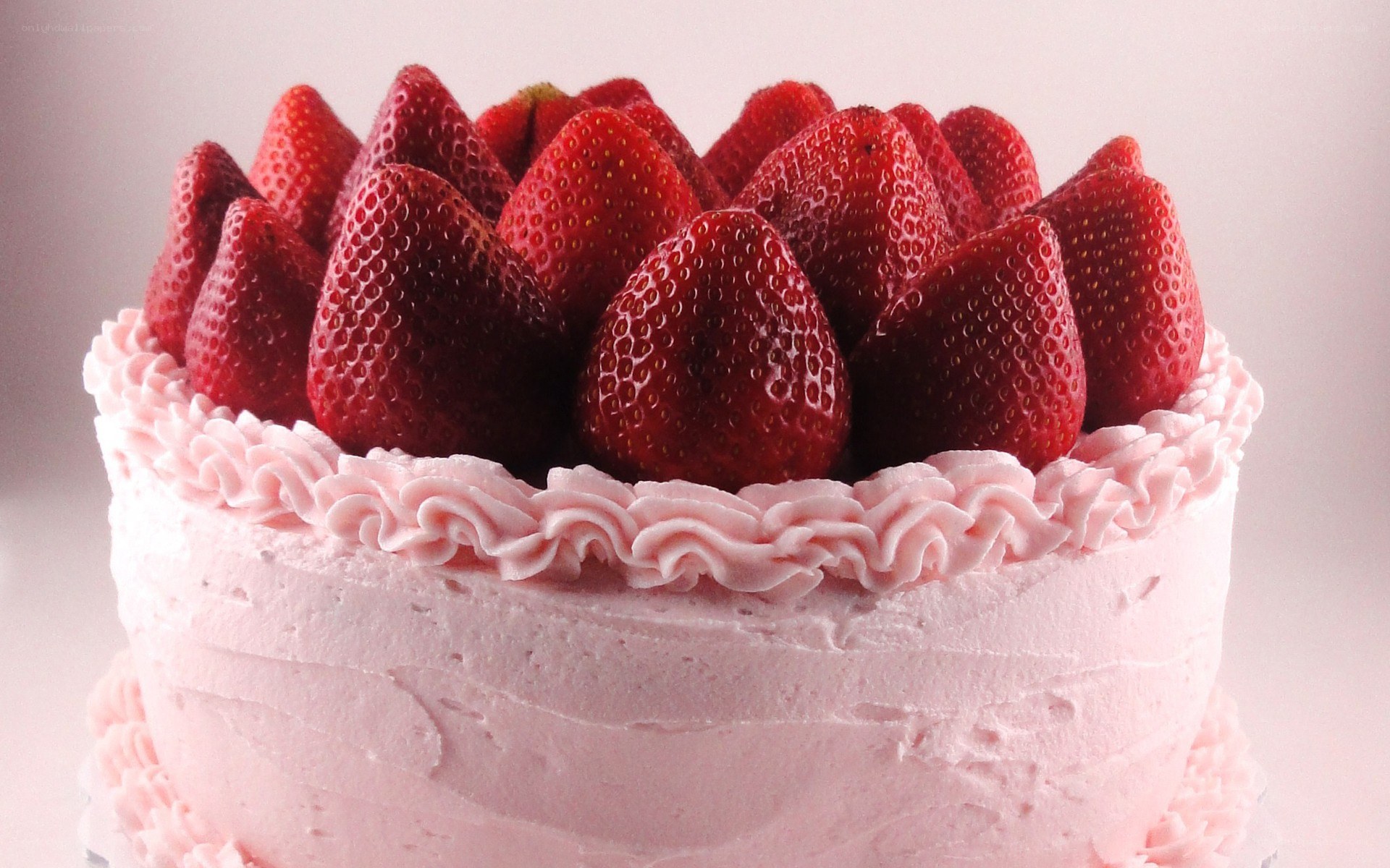 strawberry cake with pink frosting