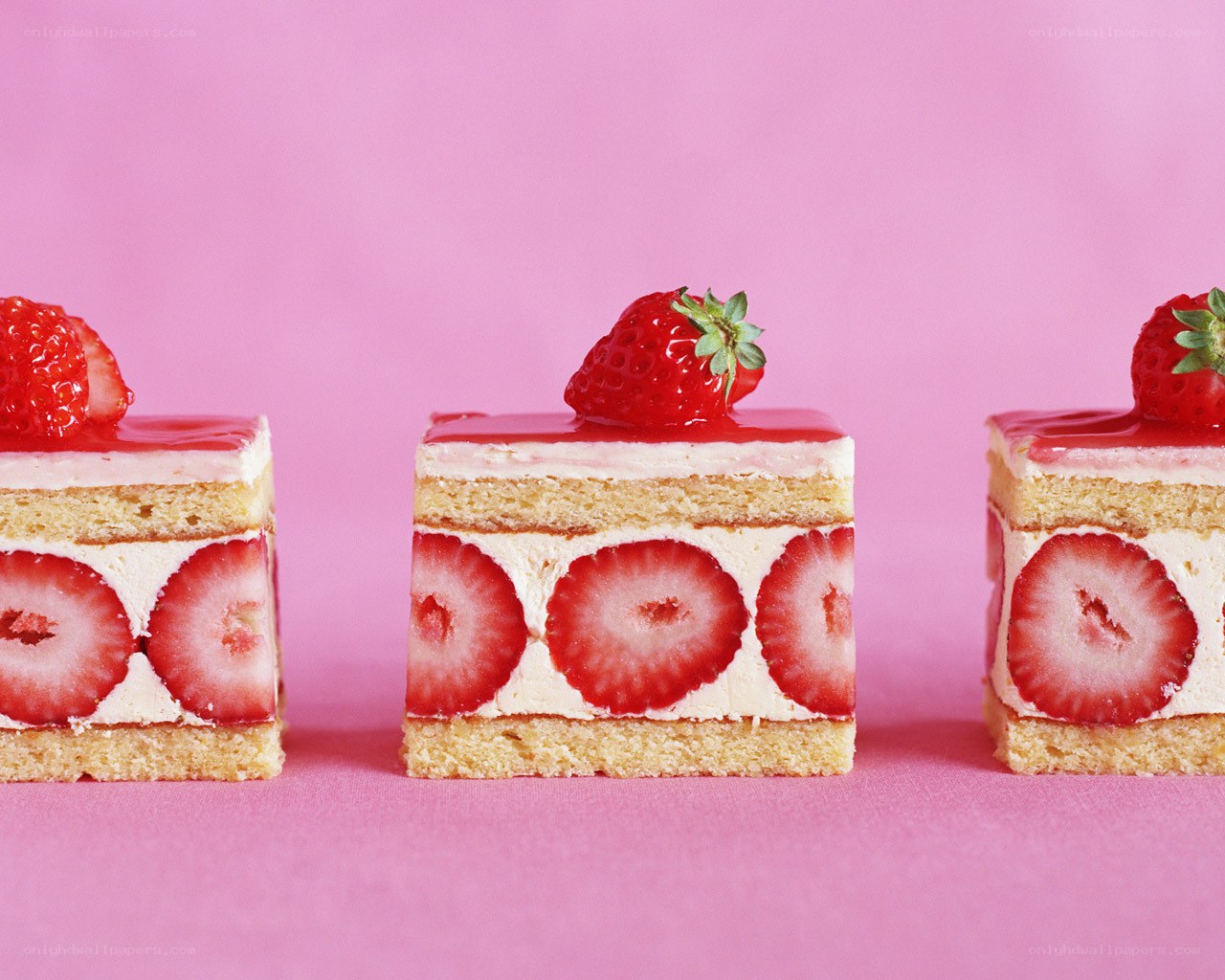 Strawberry cakes on pink