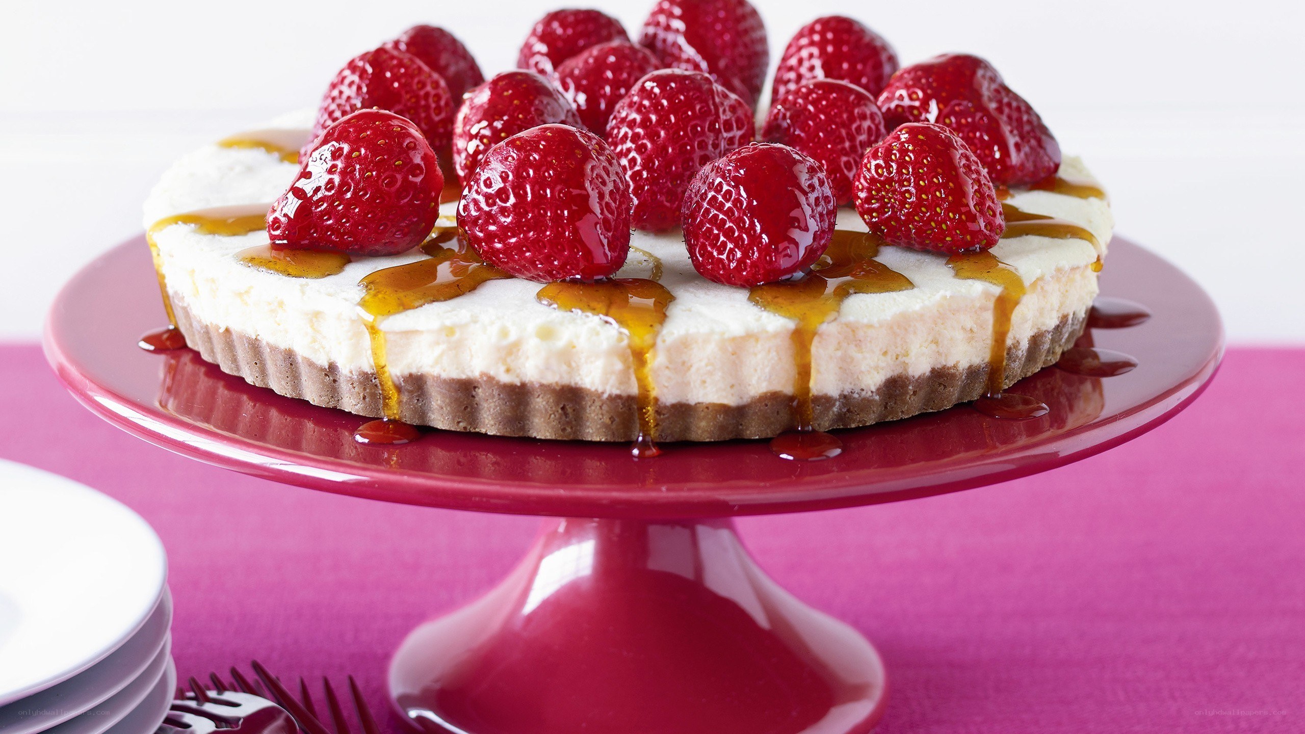 strawberry cheesecake on stand