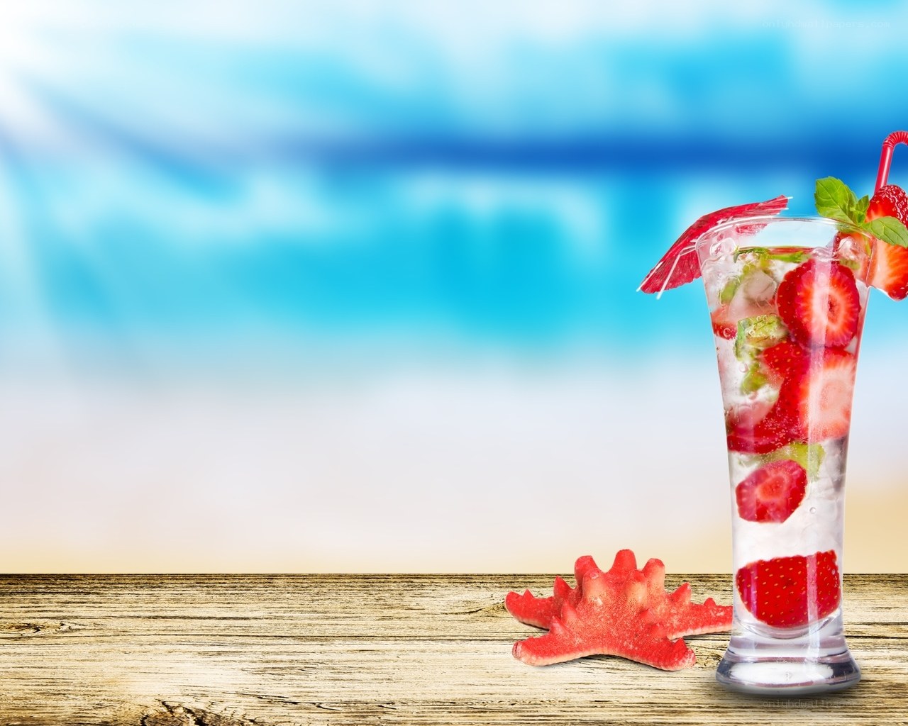strawberry cocktail on beach