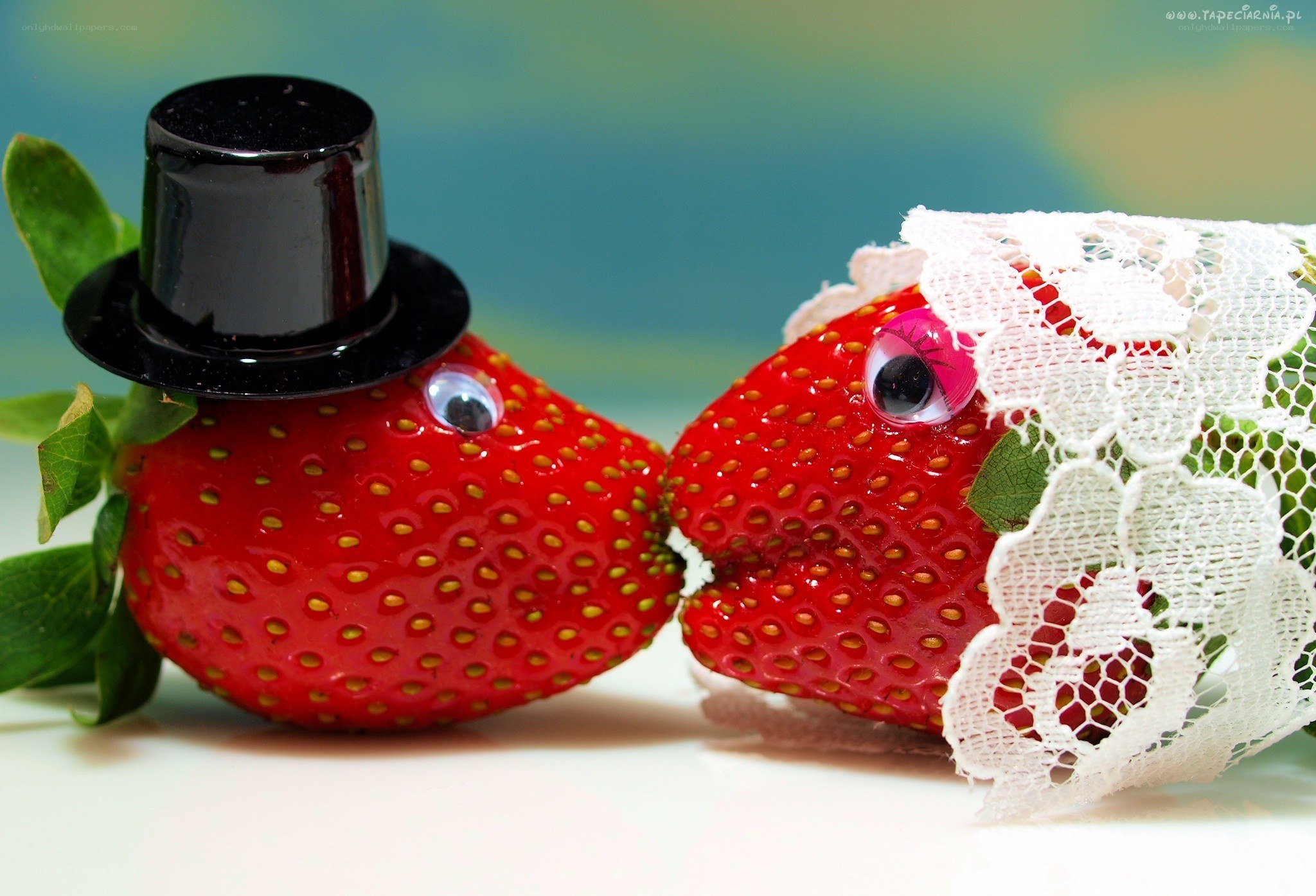 Strawberry couple kissing