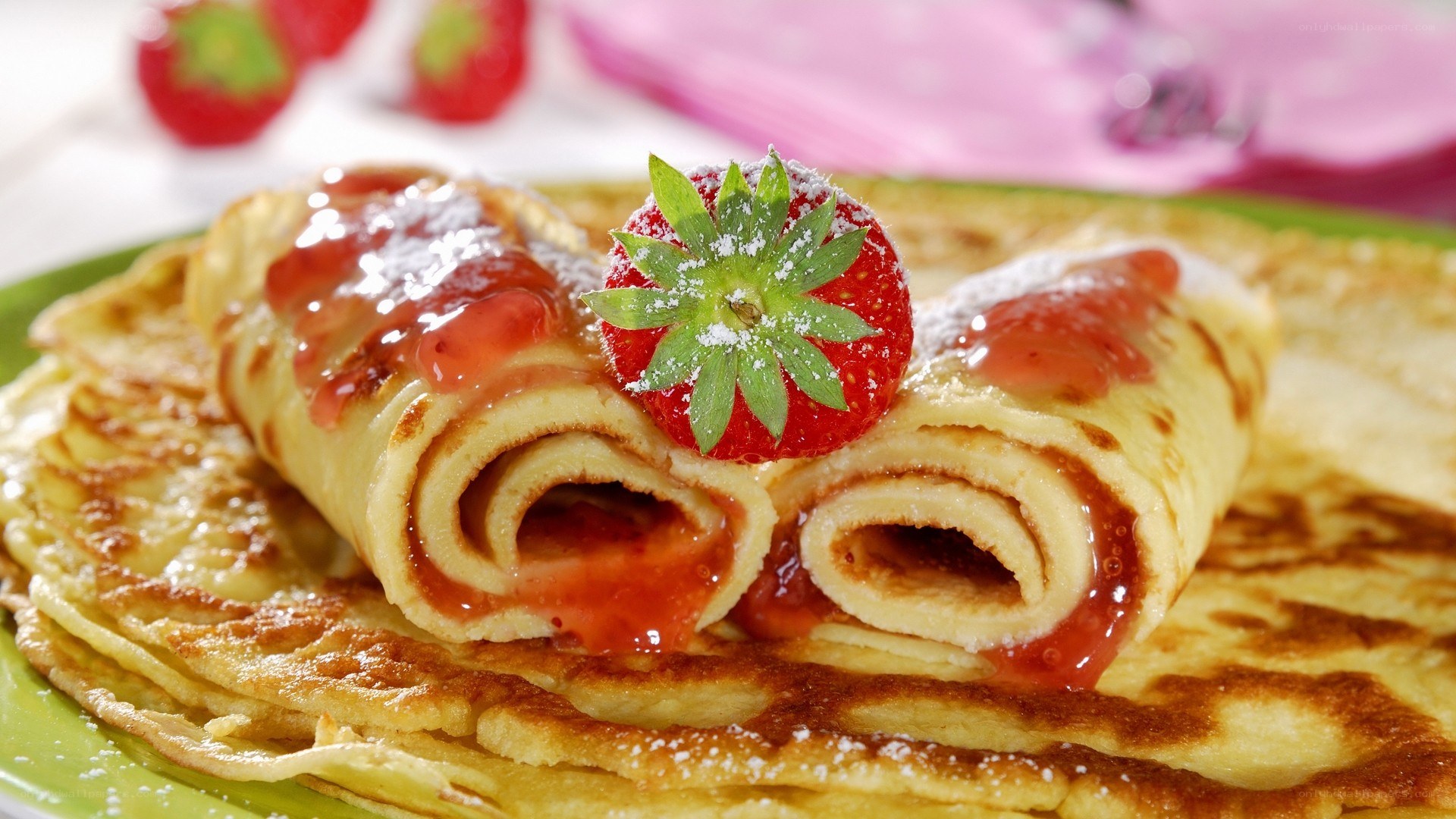 strawberry crepes on plate