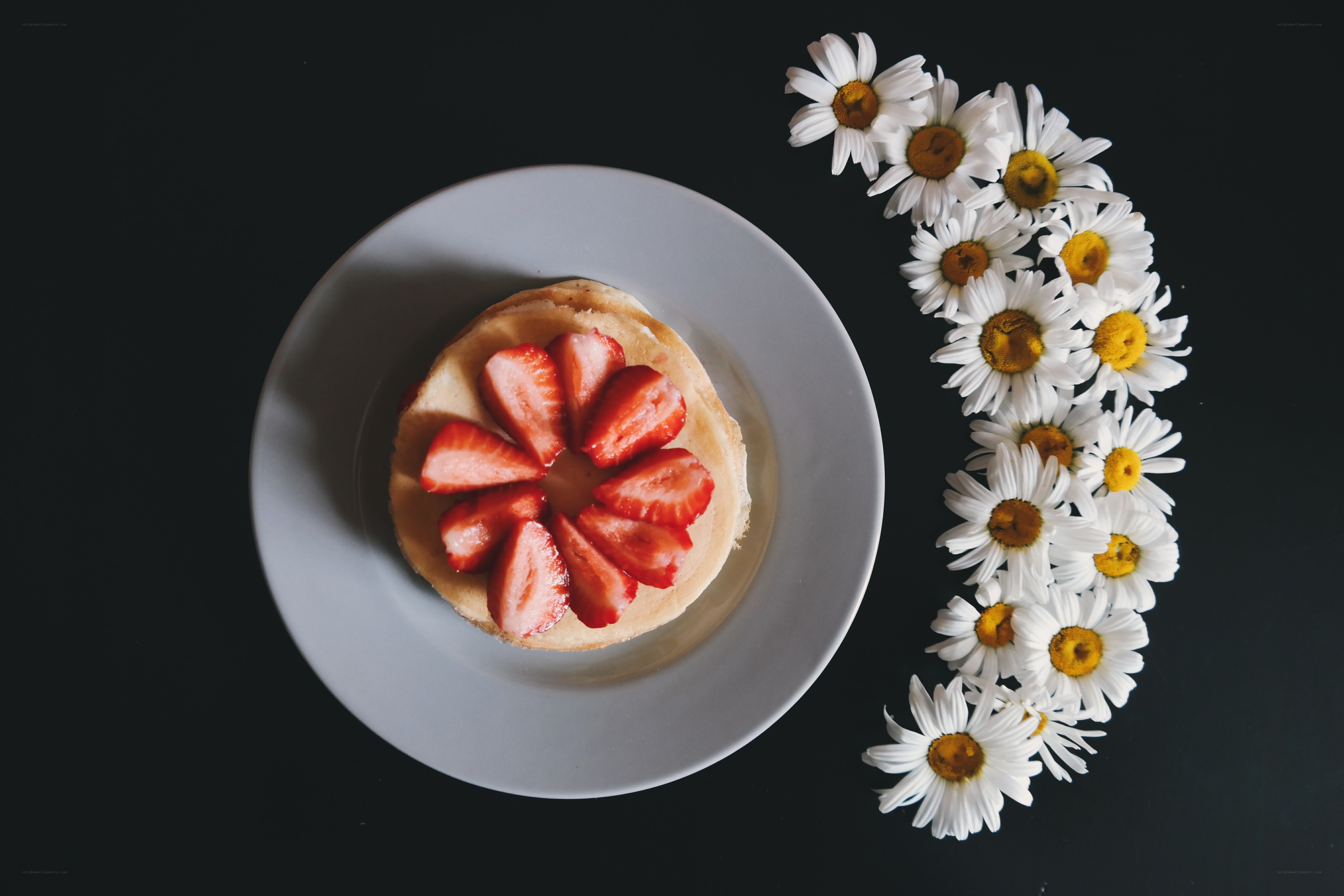 strawberry dessert with daisies