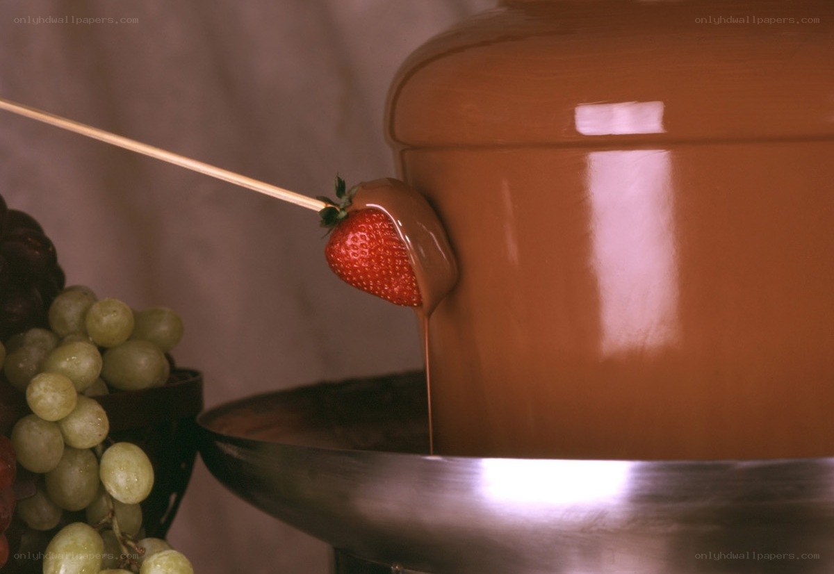 strawberry in chocolate fondue