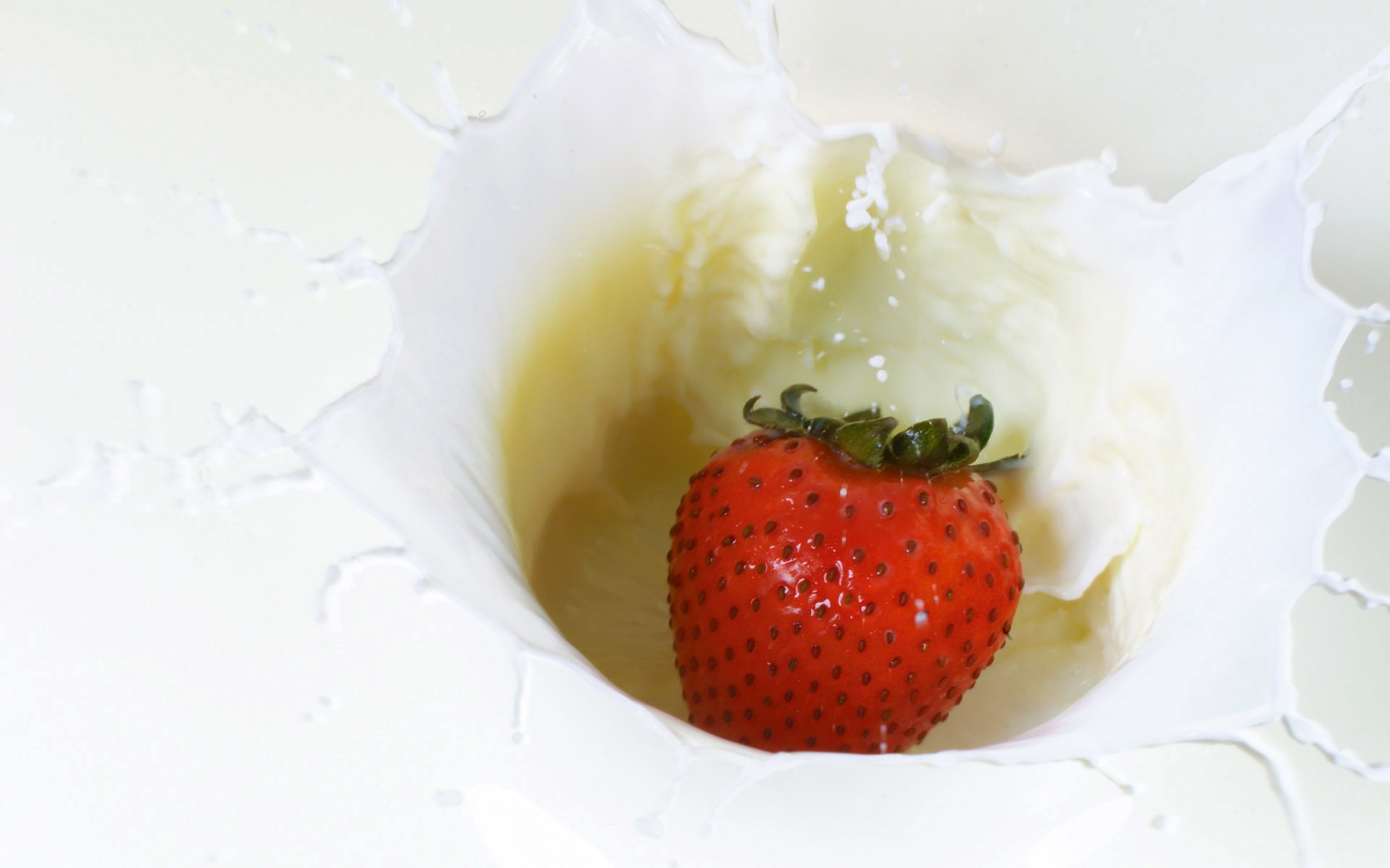 strawberry in milk splash