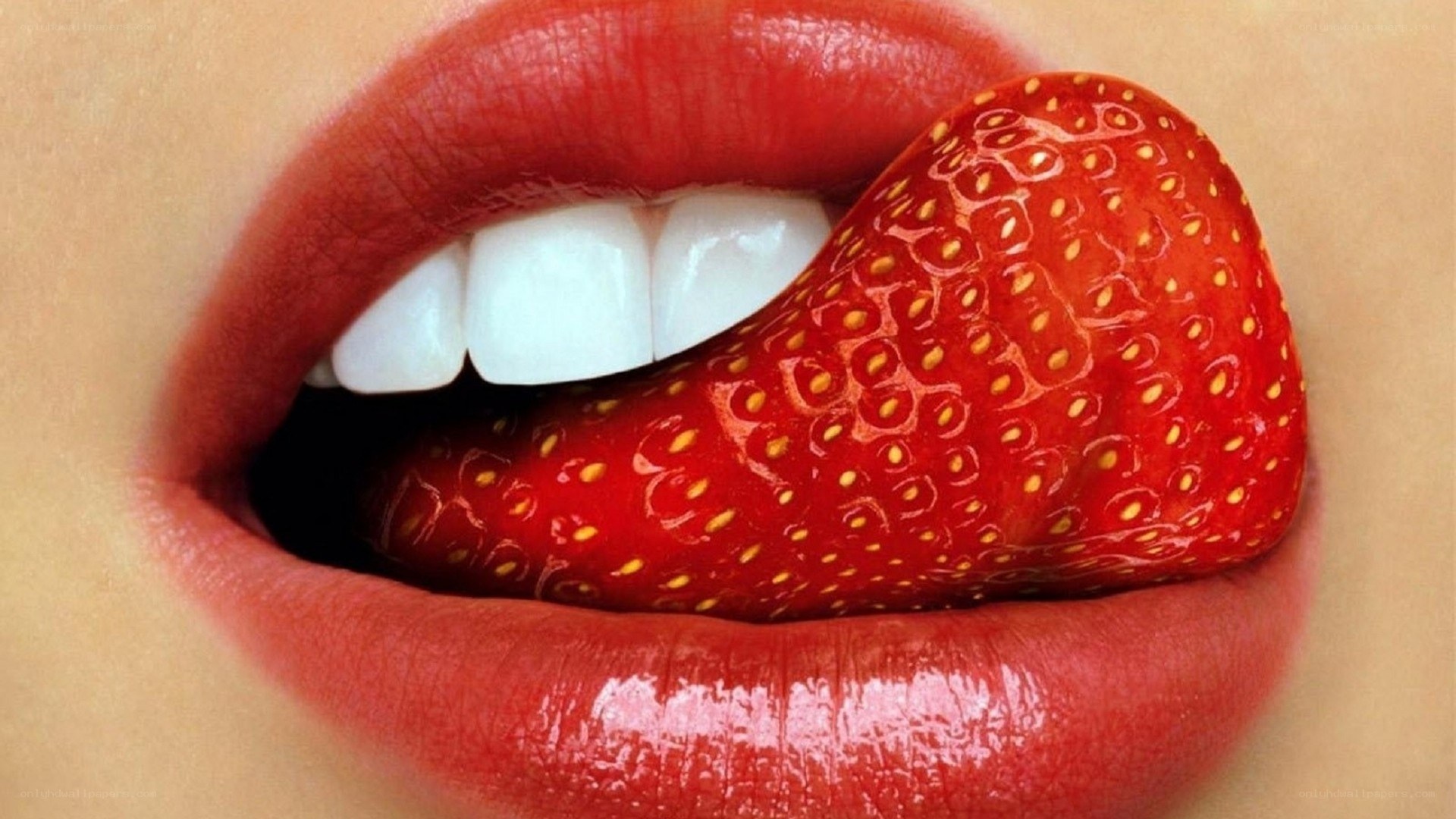 strawberry in mouth close-up