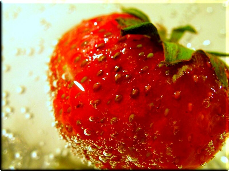 strawberry in sparkling water