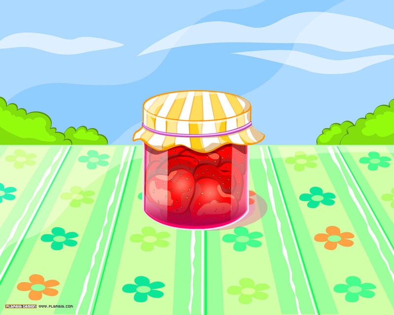 Strawberry jam on picnic table