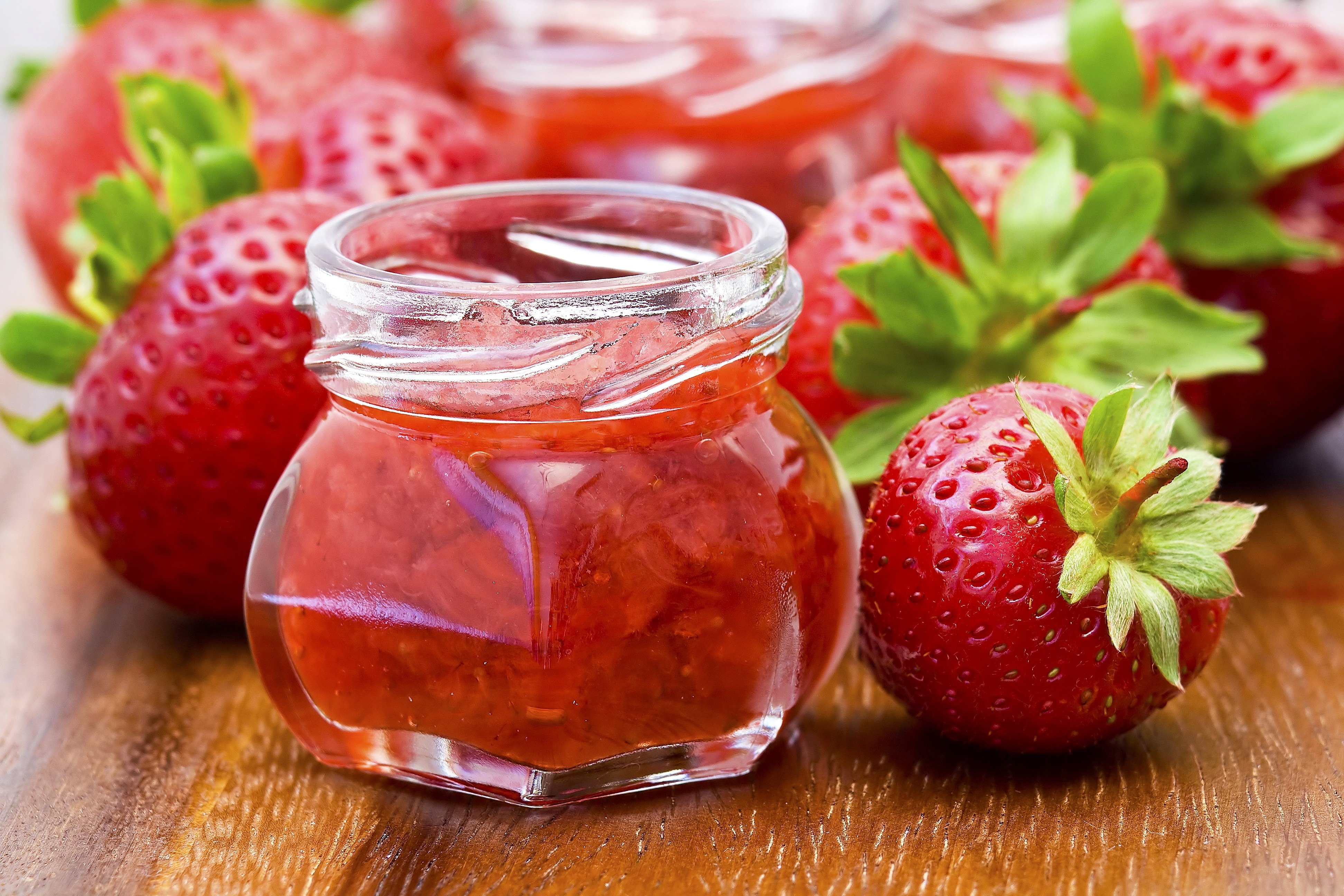 Strawberry jam with fresh berries