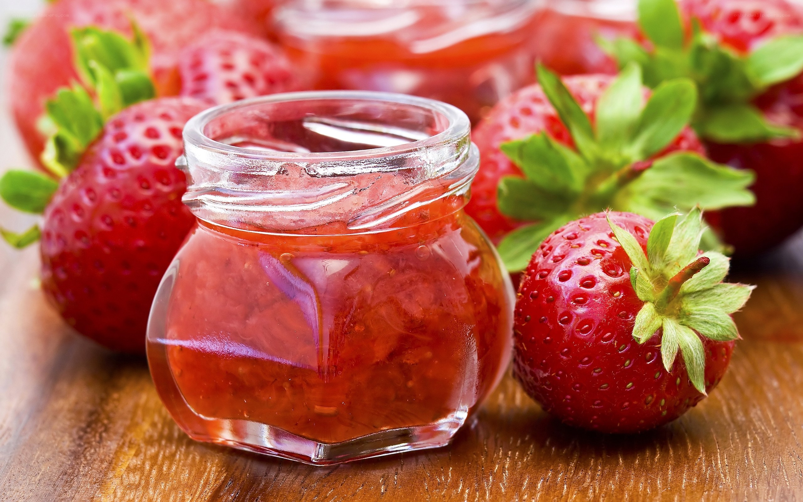 Strawberry jam with fresh strawberries