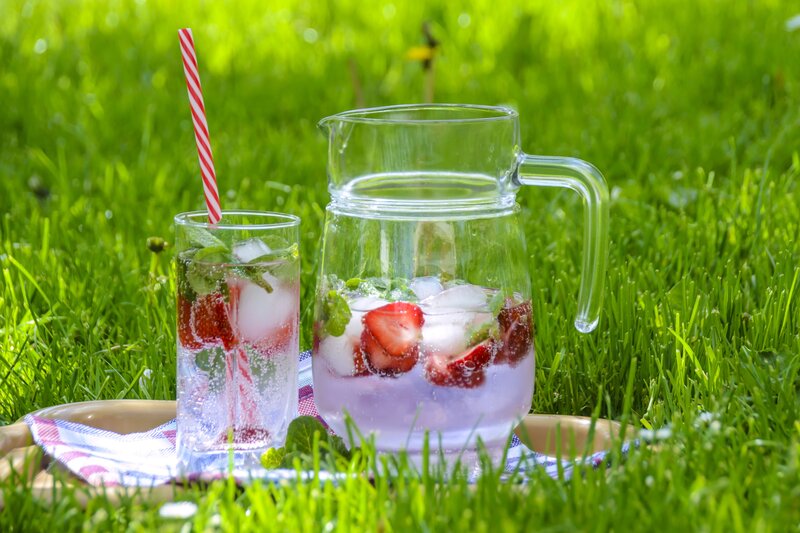 Strawberry mint drink on grass