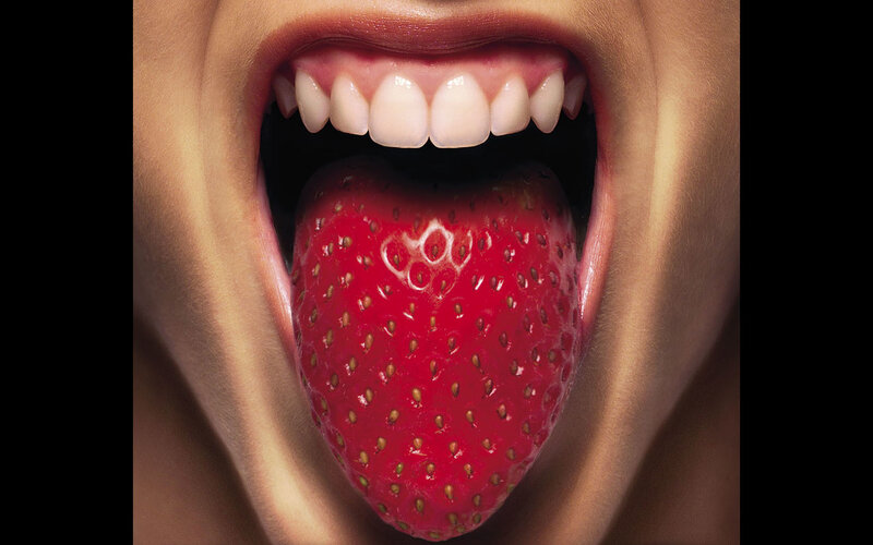 strawberry on a tongue