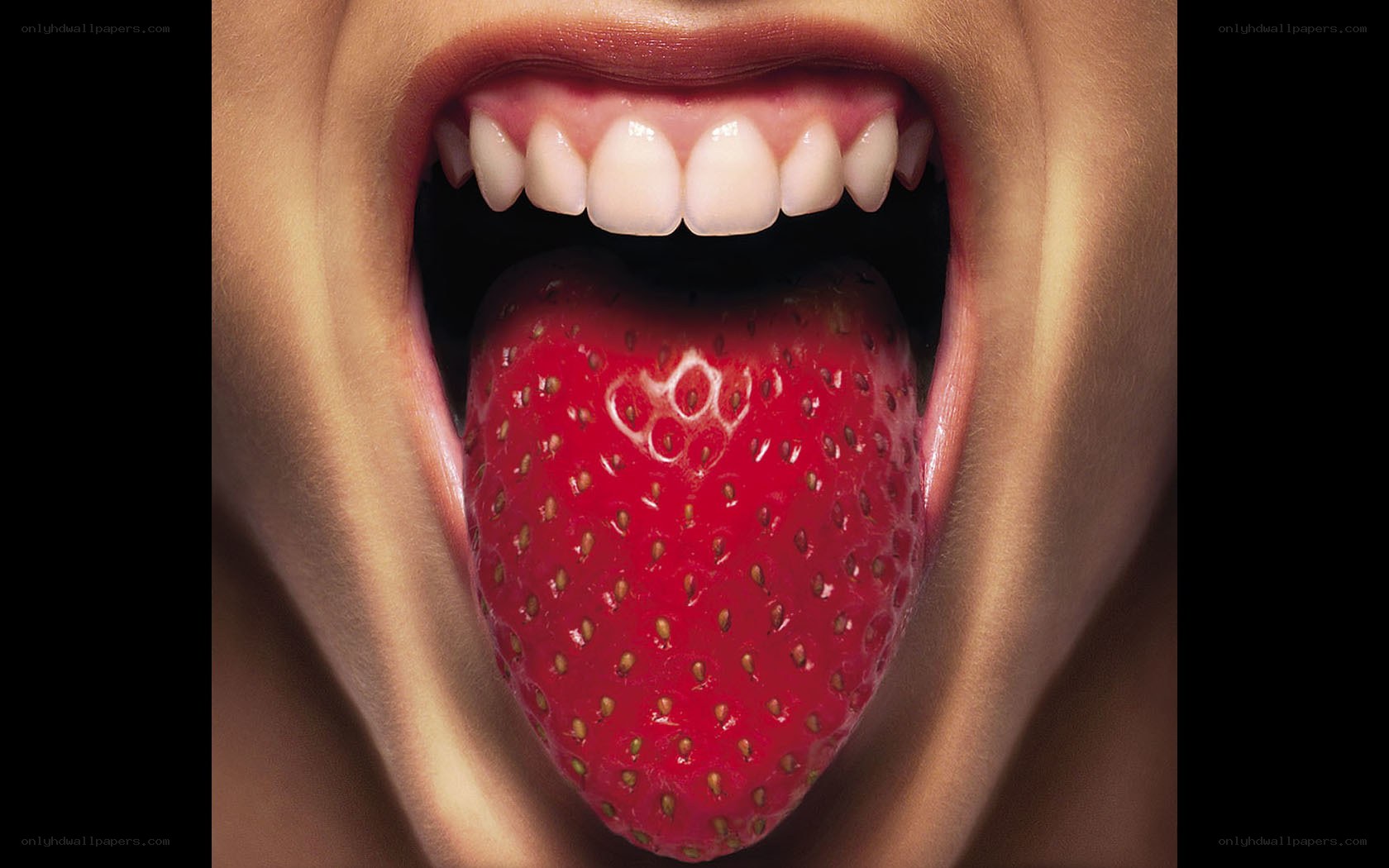 strawberry on a tongue