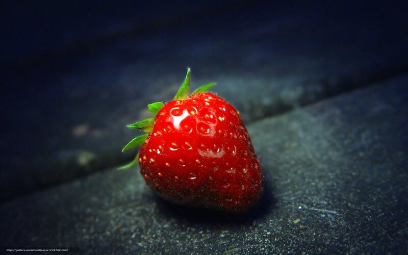 strawberry on dark surface