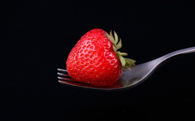 Strawberry on Fork — Red, Dramatic