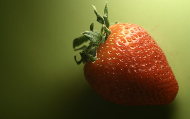 strawberry on green background