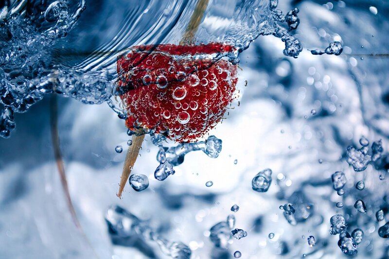strawberry splashing in water