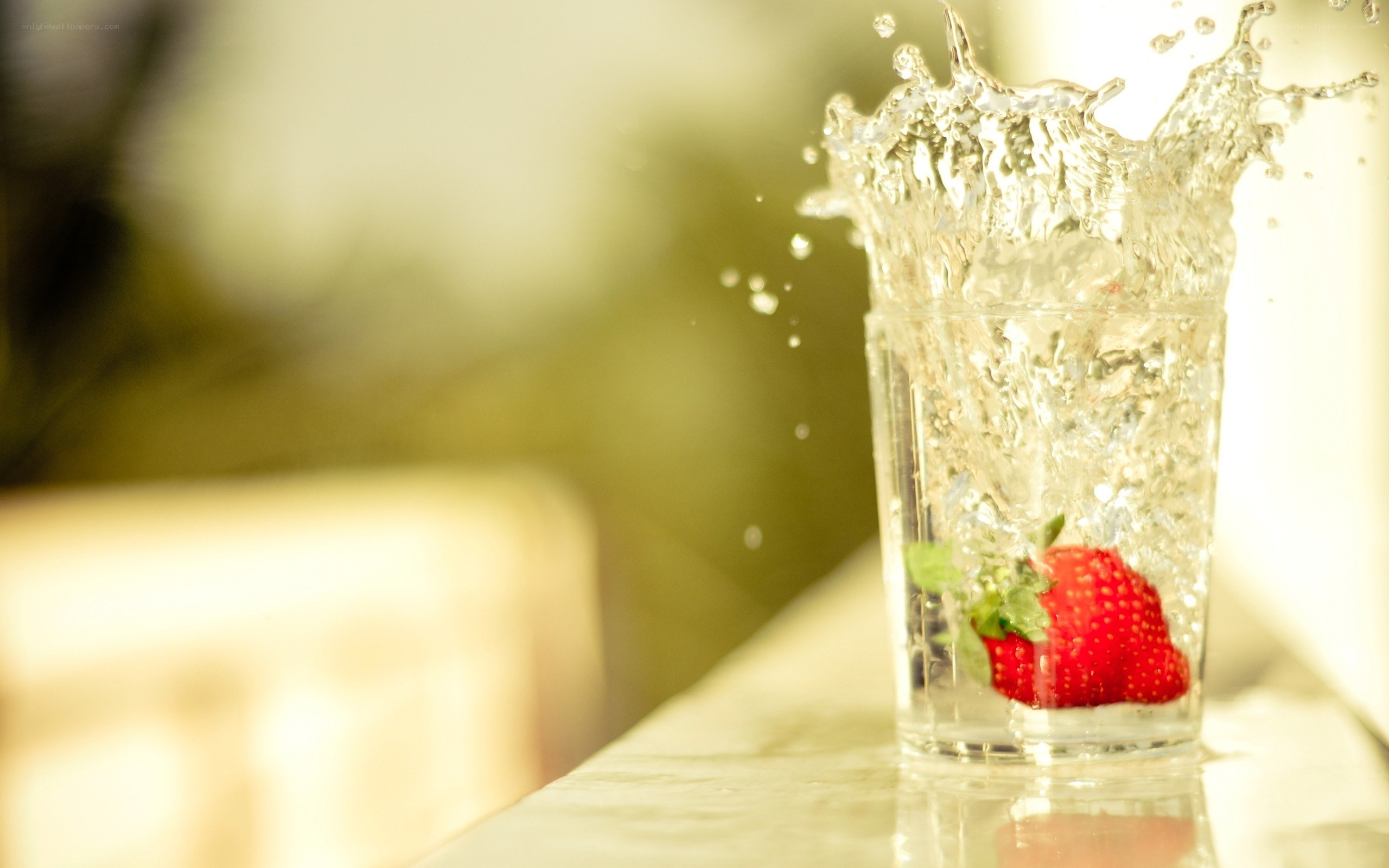 strawberry splashing in water