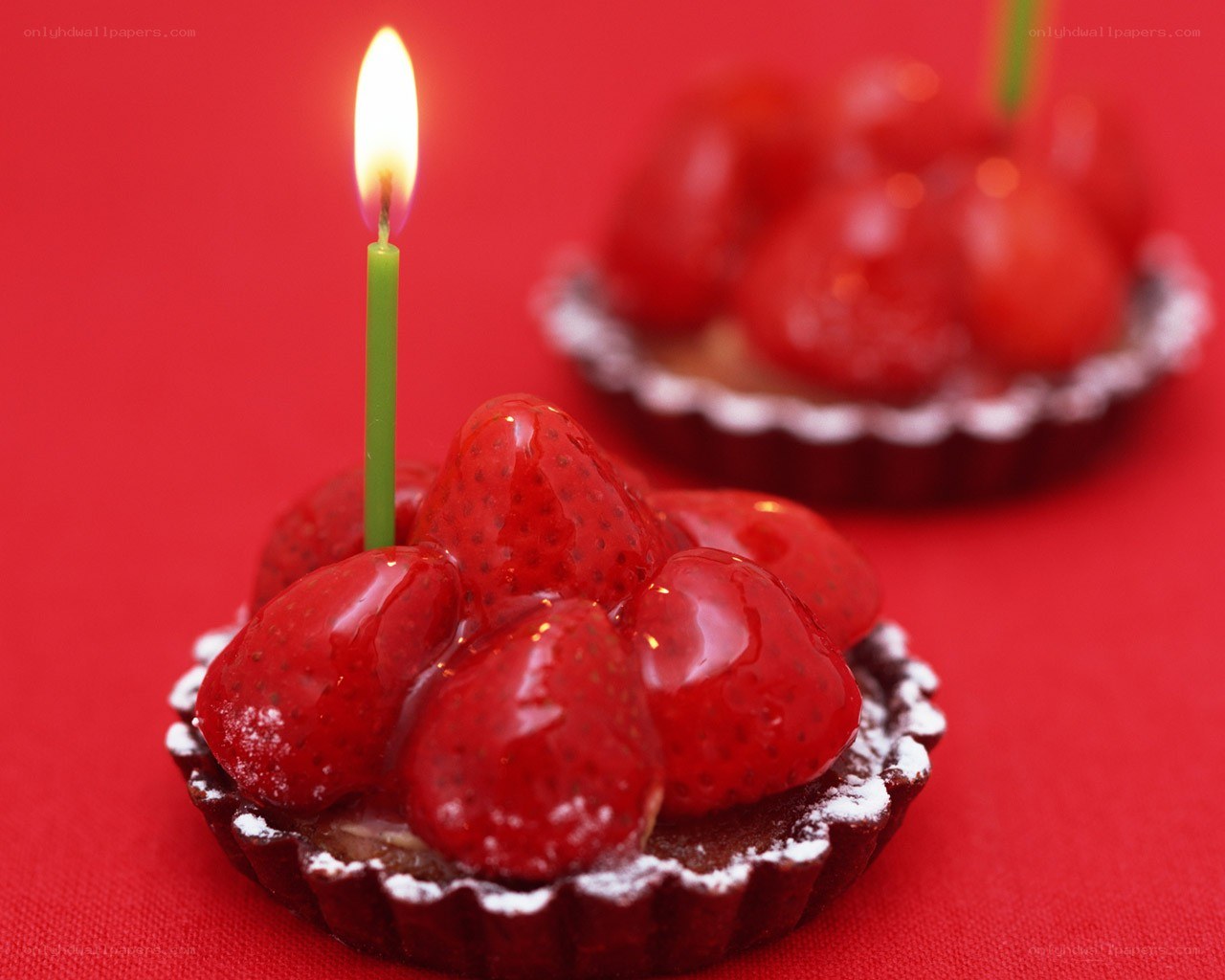 Strawberry tart with candle