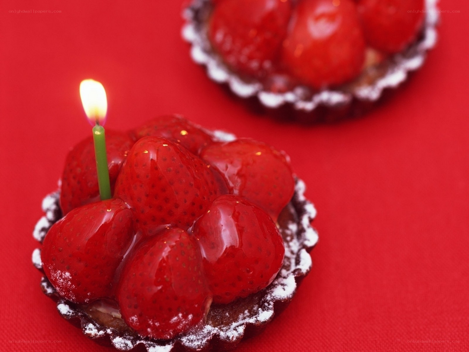 Strawberry tart with candle