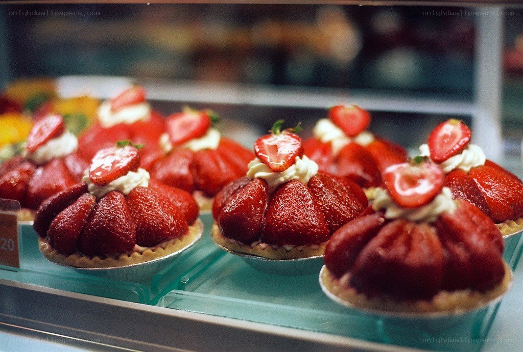 Strawberry tarts in display case