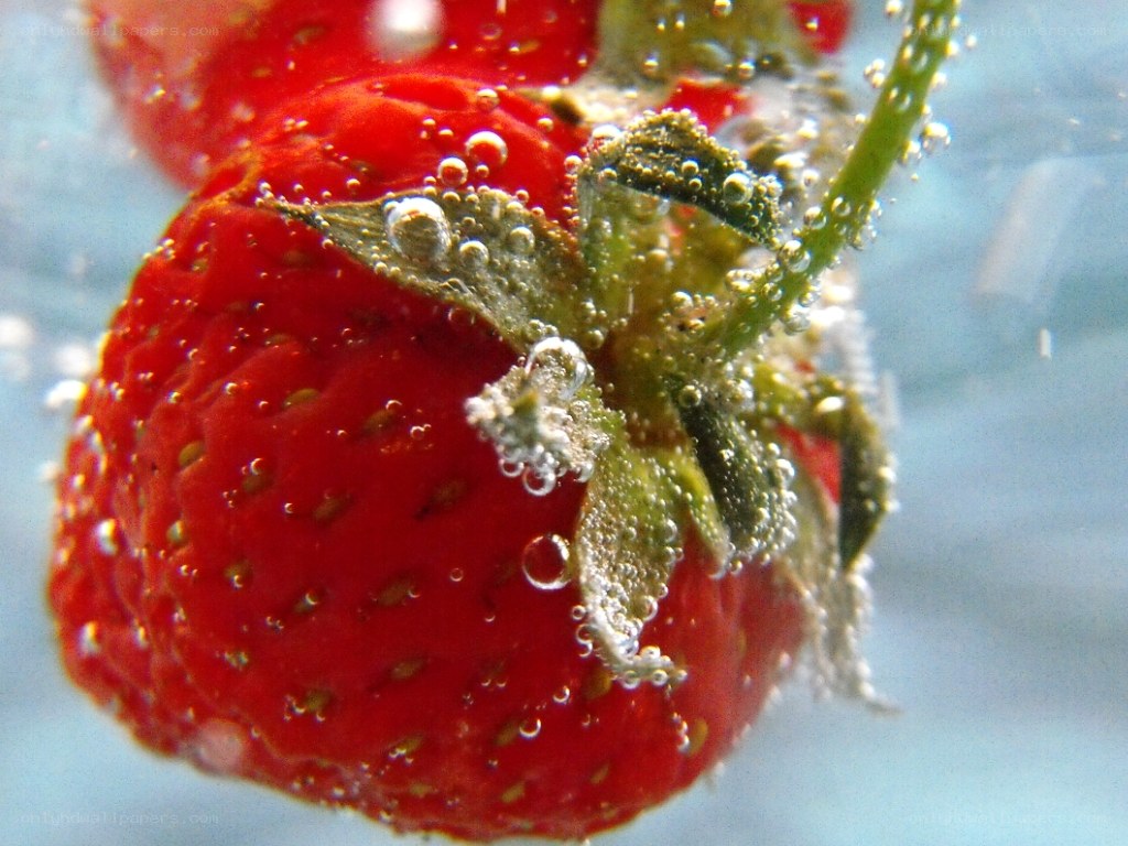 strawberry under water