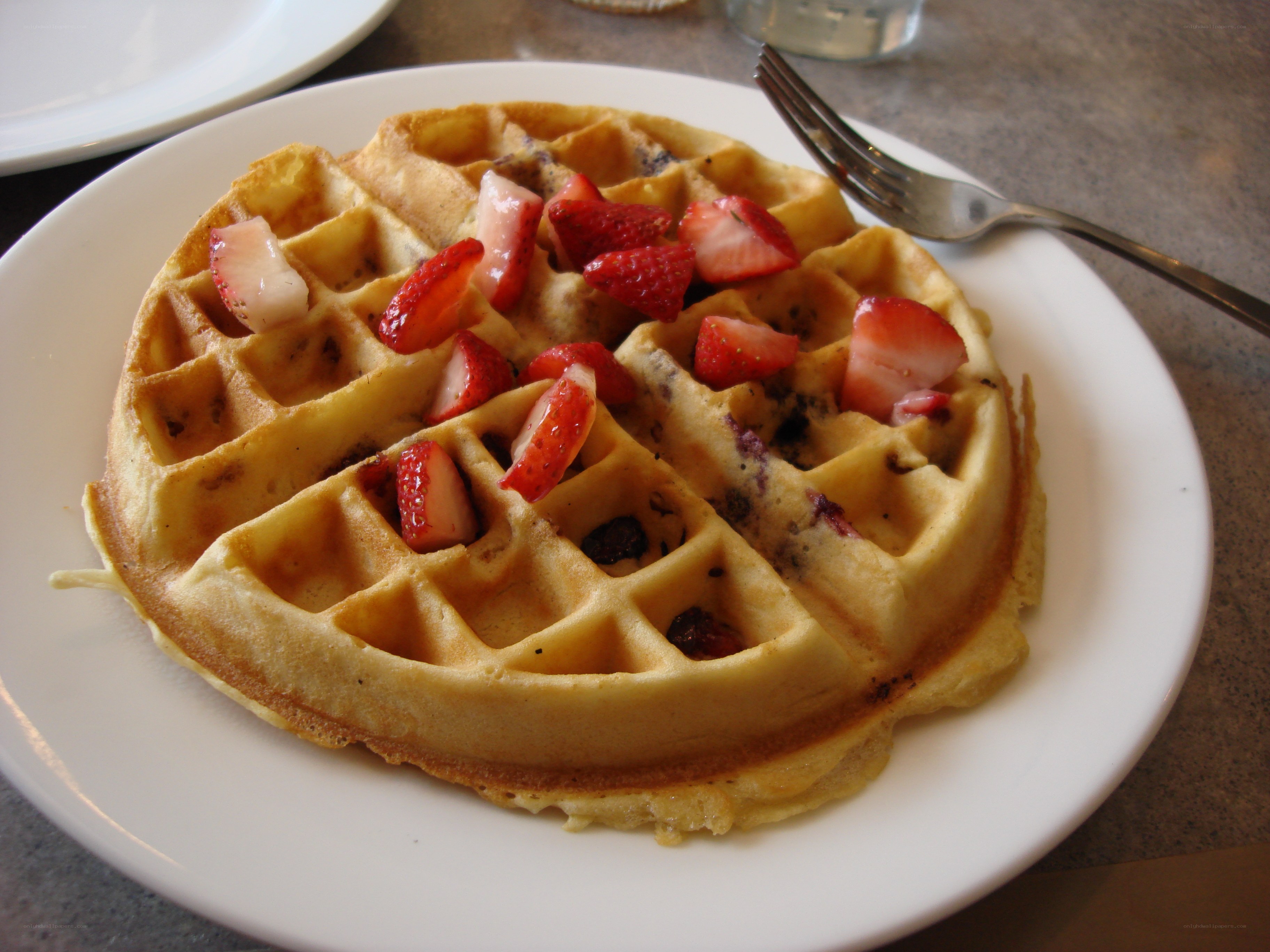 strawberry waffle on plate