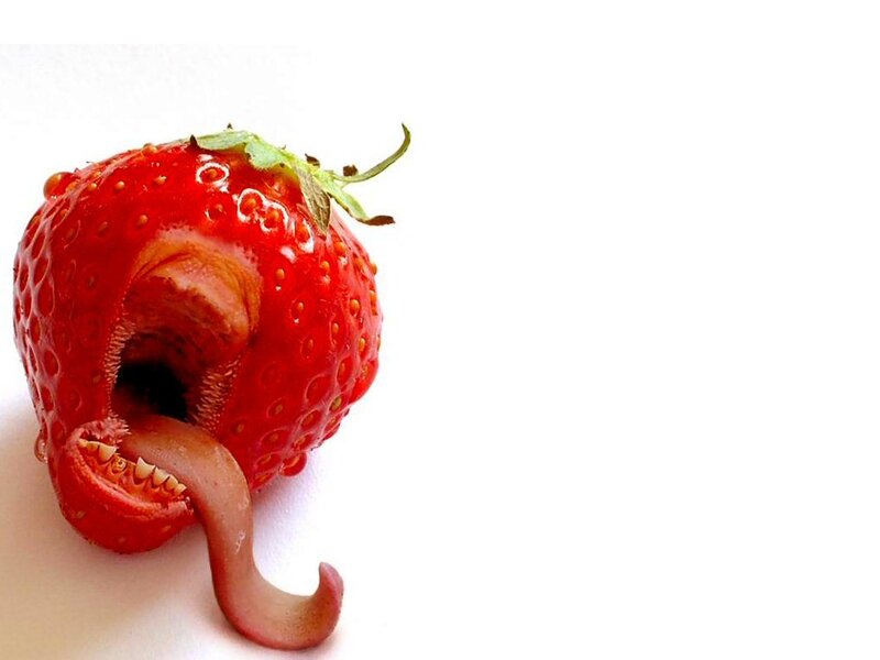 strawberry with mouth and tongue
