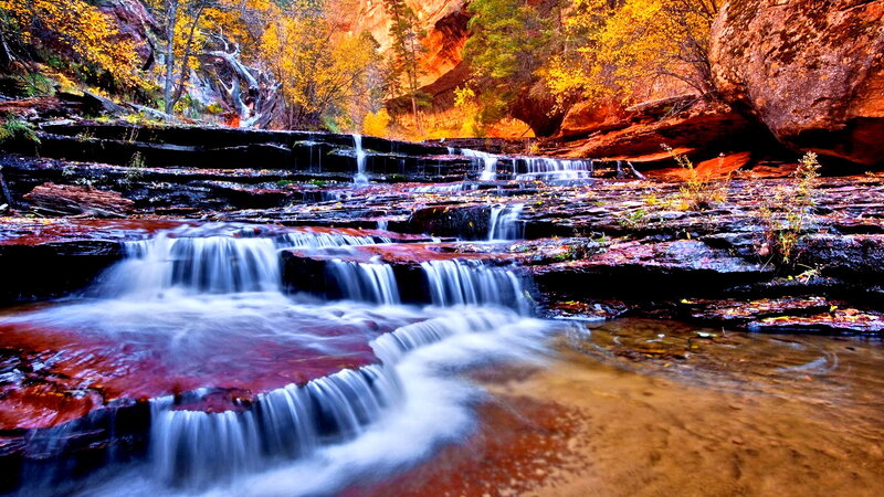Stream Cascading over Rocks — Orange