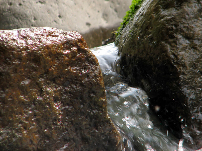 Stream Flowing Between Rocks