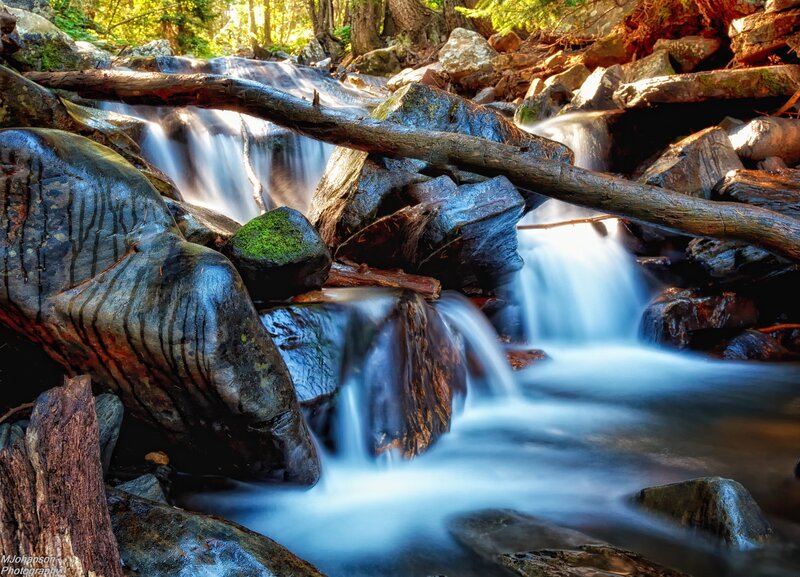 Stream Flowing over Rocks — Blue, Serene, Afternoon, Photograph, Logs