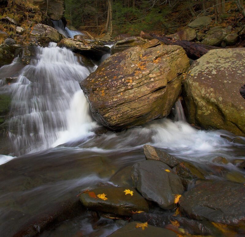 Stream Flowing over Rocks — Brown