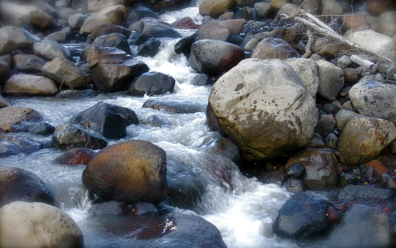 Stream Flowing over Rocks — Gray