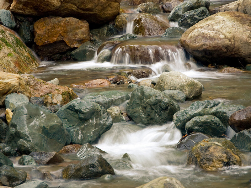 Stream Flowing over Rocks — Green, Serene, Photograph, Waterfall