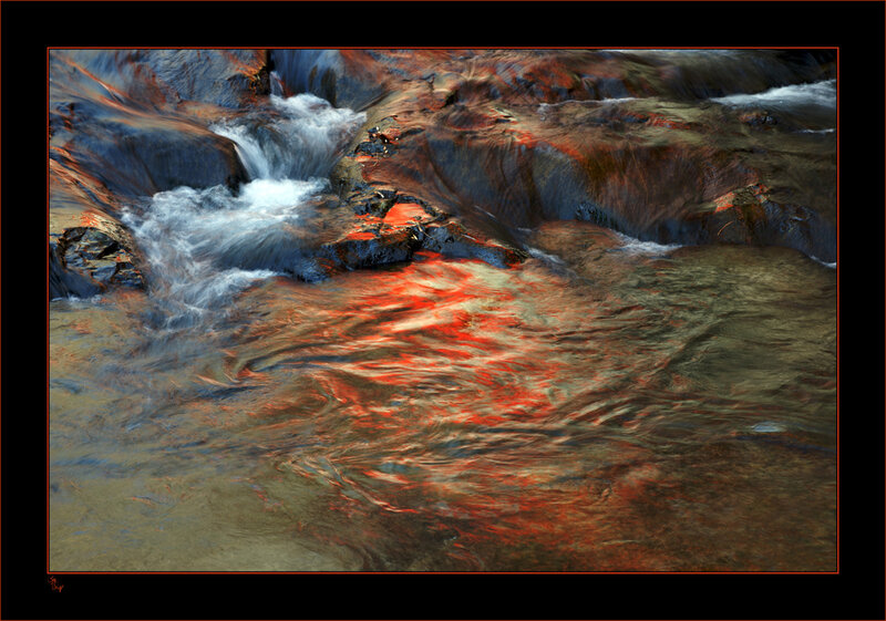 Stream Flowing over Rocks — Red
