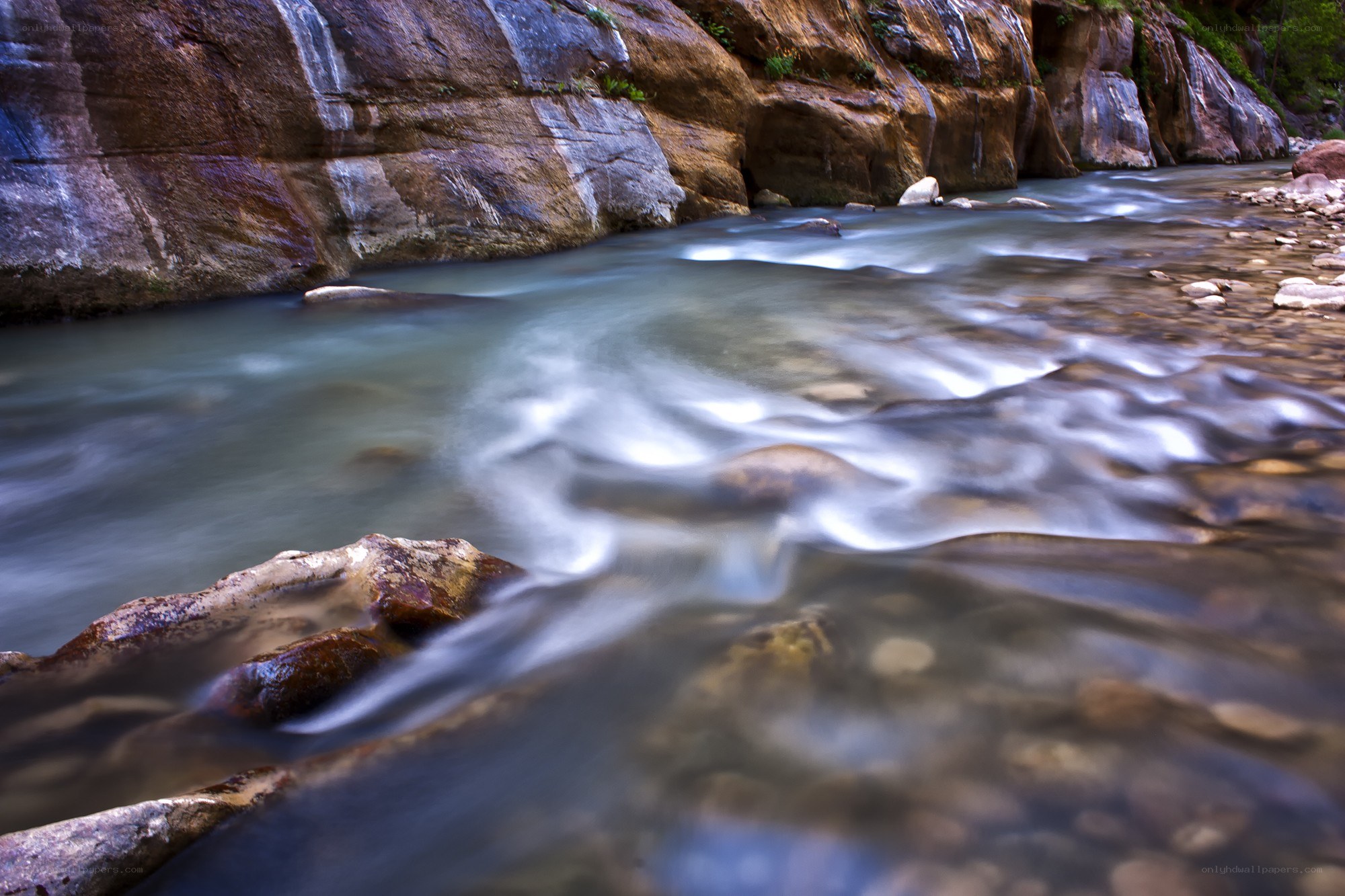Stream flowing through a canyon