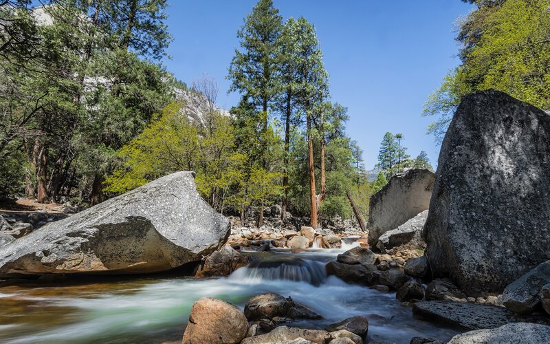 Stream Flowing Through Rocks — Blue, Serene
