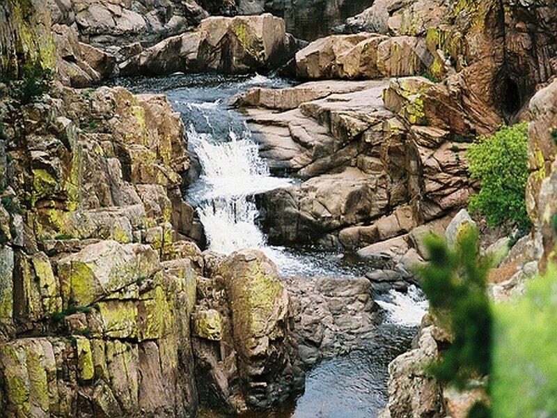 Stream Flowing Through Rocks — Brown, Natural