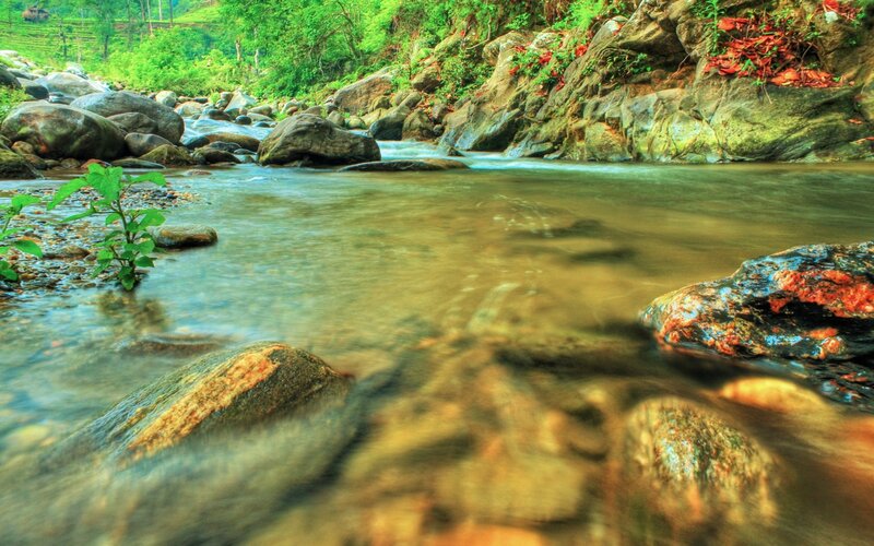 Stream flowing through rocky landscape