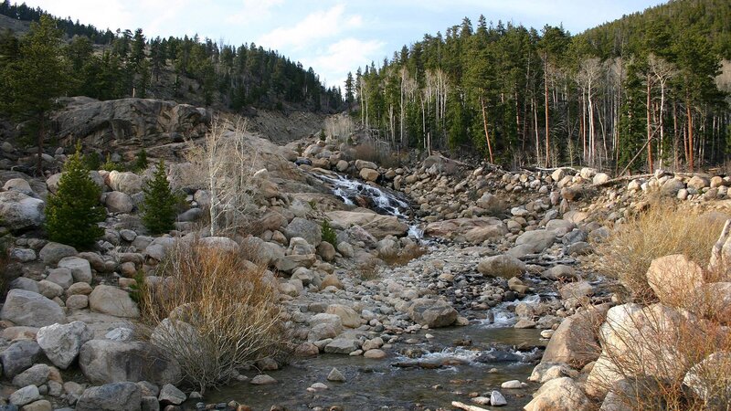 Stream in Rocky Valley — Green, Serene