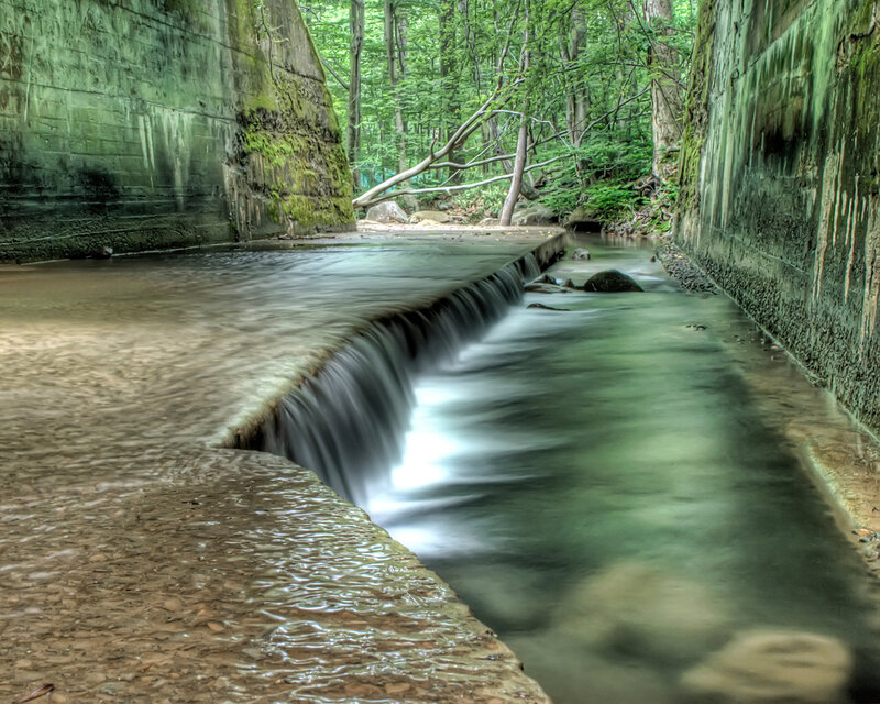 Stream under a concrete bridge